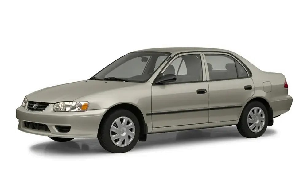 Silver sedan car on a white background, showcasing its side profile and design.