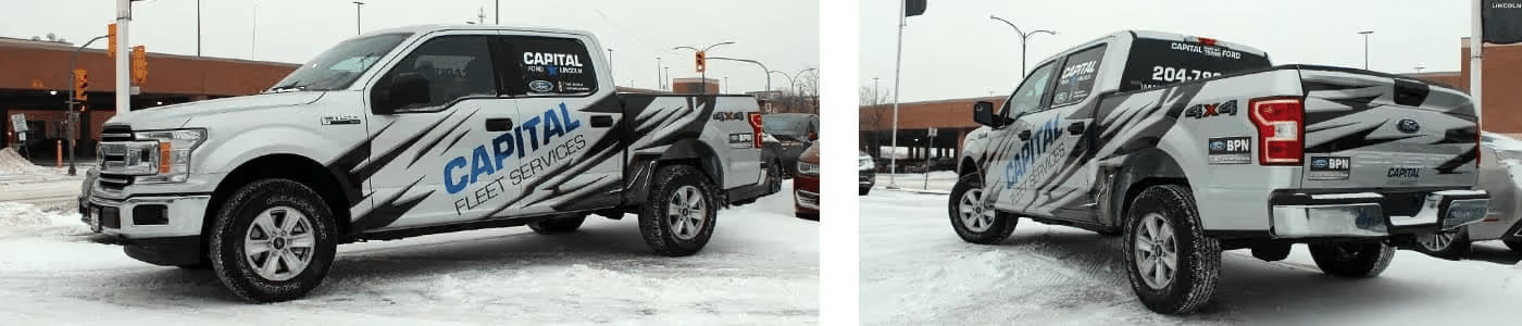 White Ford pickup truck with "Capital Fleet Services" branding in a snowy parking lot.