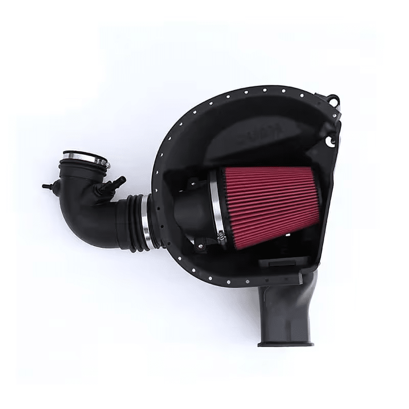 Cold air intake system with a red filter and black tubing, isolated on white background.