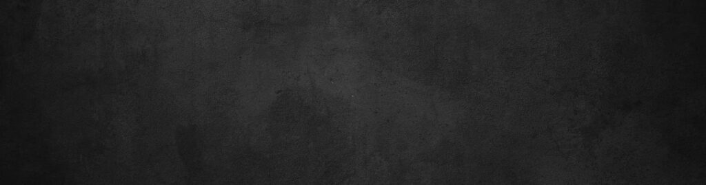 Dark textured concrete surface creates a minimal, industrial-style background.